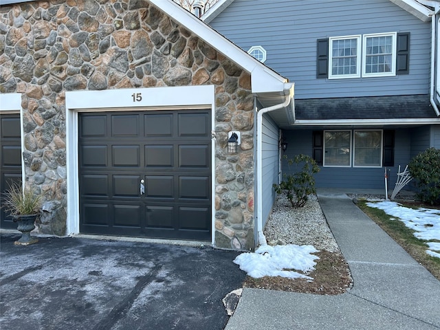 property entrance featuring a garage