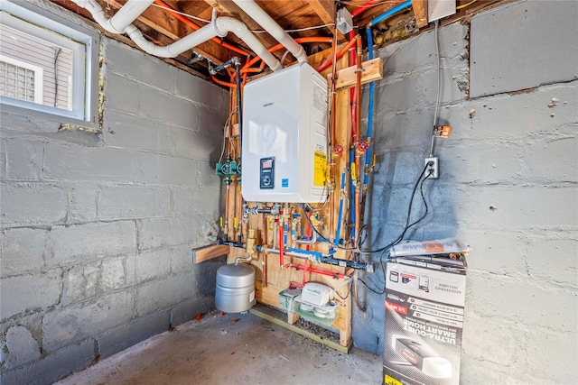 utility room featuring water heater