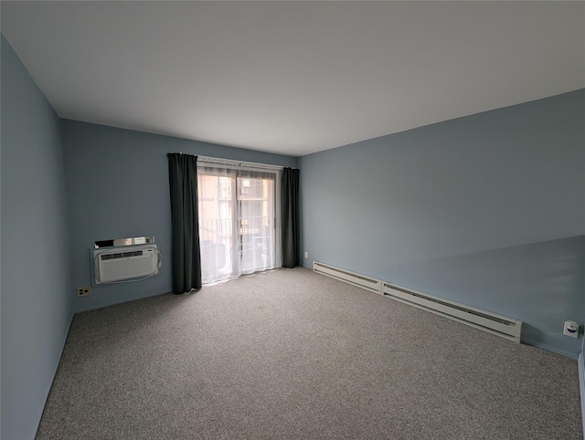 spare room with a baseboard heating unit, a wall mounted AC, and carpet