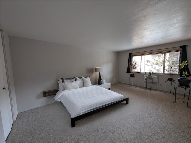 bedroom featuring light colored carpet