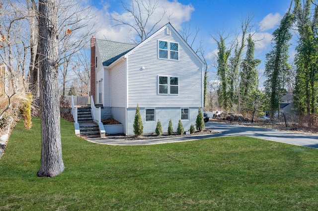 exterior space with a lawn