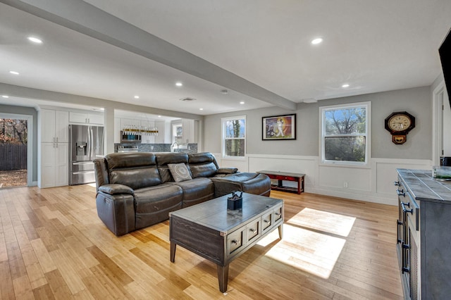 living room featuring light wood-type flooring