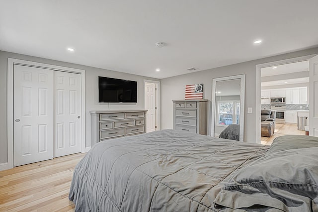 bedroom featuring light hardwood / wood-style flooring