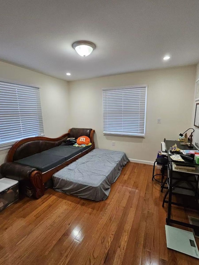 bedroom featuring hardwood / wood-style flooring