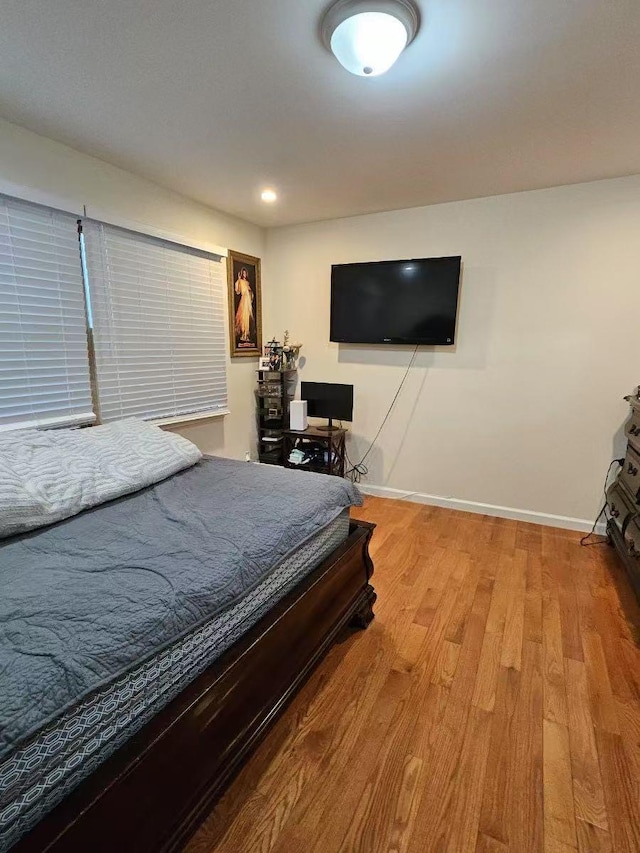 bedroom featuring light hardwood / wood-style floors