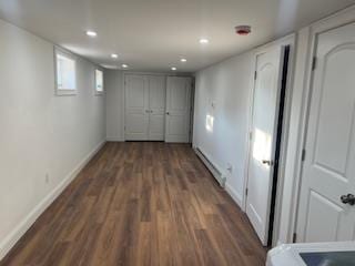 hall with dark hardwood / wood-style floors