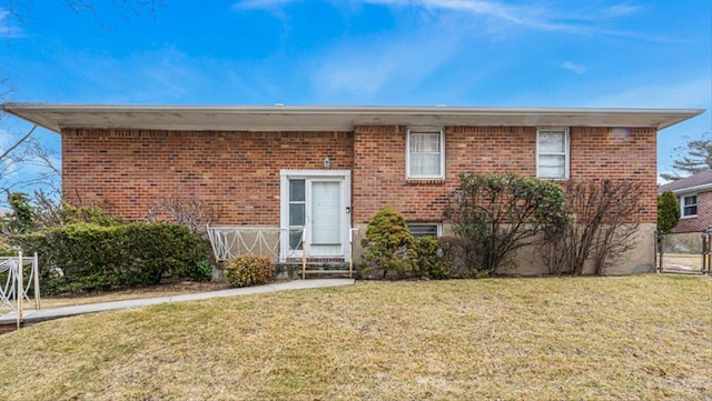 view of front of home with a front yard