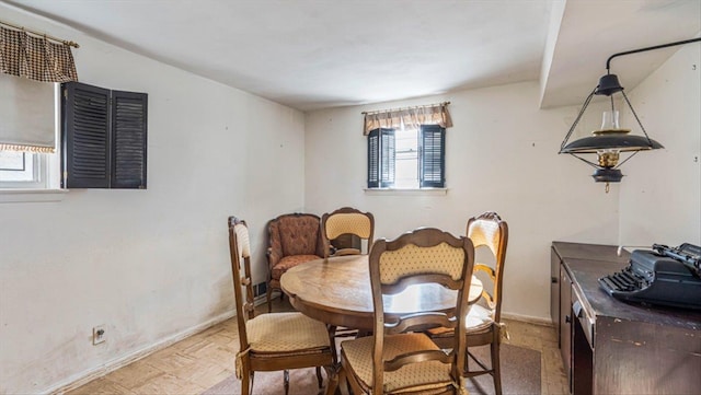 dining area with light parquet flooring