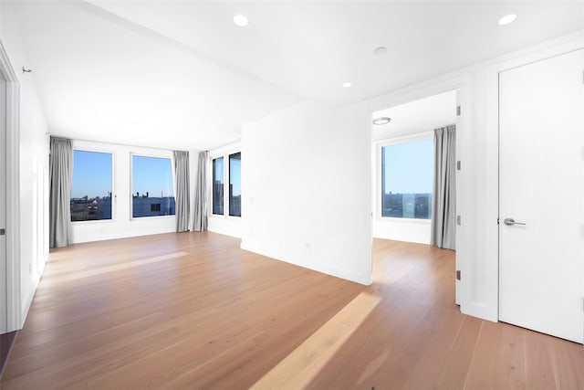 unfurnished room featuring light hardwood / wood-style flooring