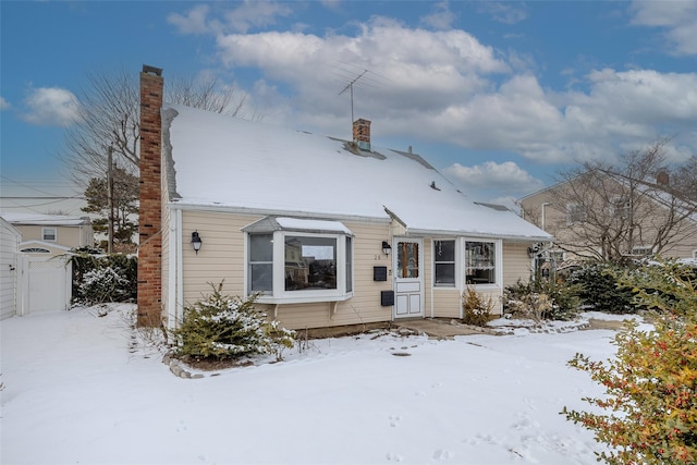 view of snow covered house