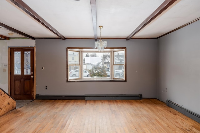 unfurnished dining area with a baseboard heating unit, beamed ceiling, and light wood-type flooring