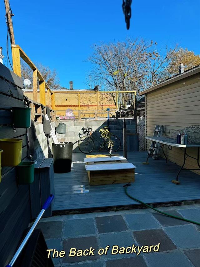 view of patio featuring a wooden deck