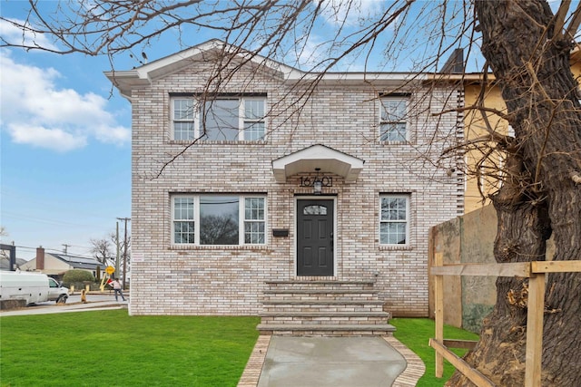 view of front of property with a front lawn