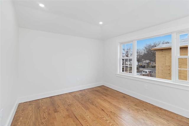 empty room featuring wood-type flooring