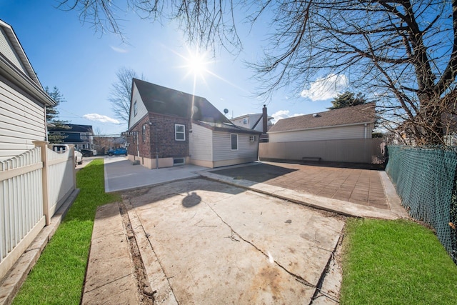 back of house featuring a patio area