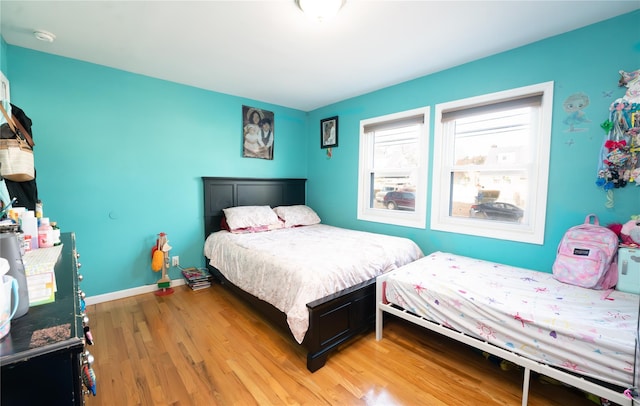 bedroom featuring hardwood / wood-style floors