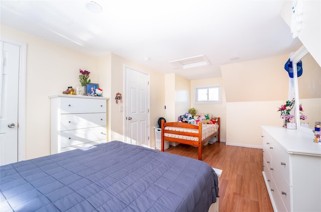 bedroom featuring light wood-type flooring