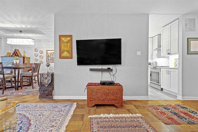 living room featuring light parquet flooring