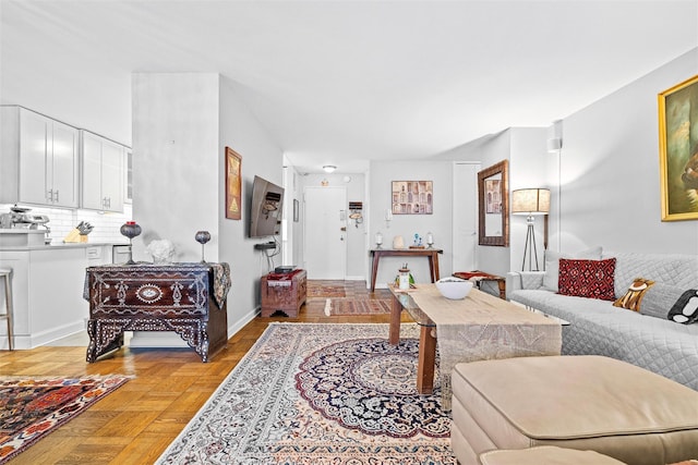 living room with light parquet floors