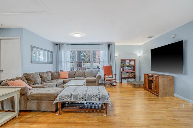 living room featuring light hardwood / wood-style flooring