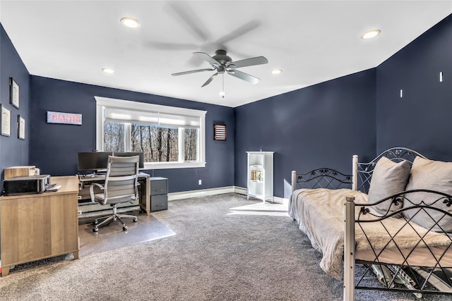 bedroom featuring ceiling fan, baseboard heating, and carpet