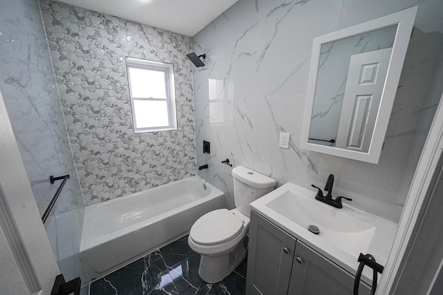 full bathroom with tiled shower / bath, tile walls, vanity, and toilet