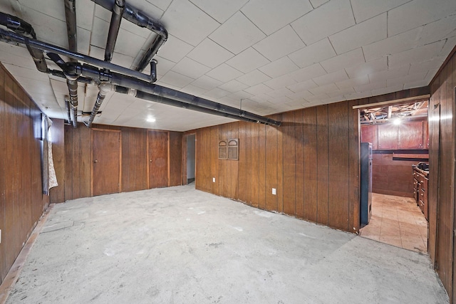 basement with wood walls