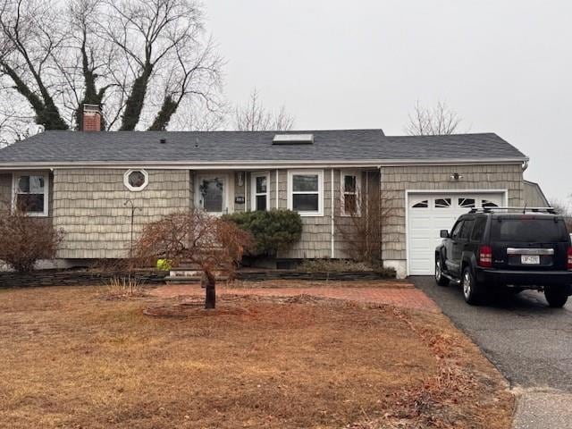 single story home with a garage