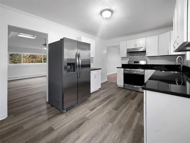 kitchen featuring sink, stainless steel appliances, dark hardwood / wood-style floors, and white cabinets