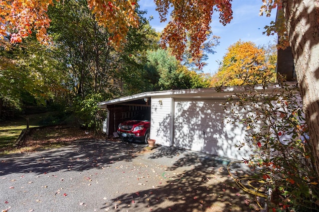 garage with a carport