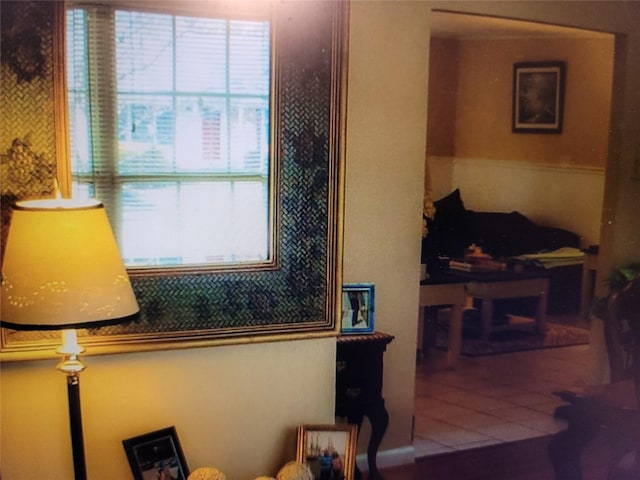 interior space with a healthy amount of sunlight and tile patterned floors