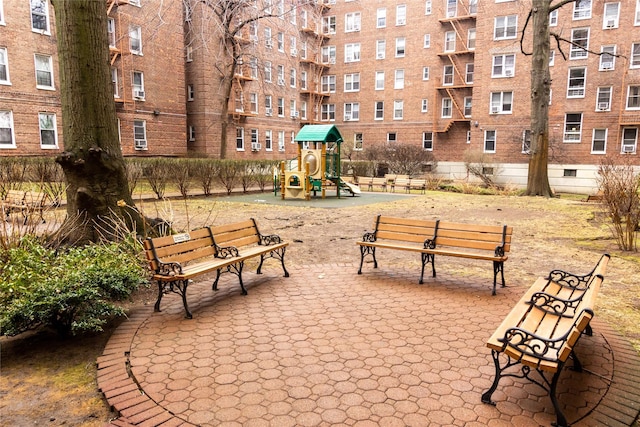 view of home's community with a playground