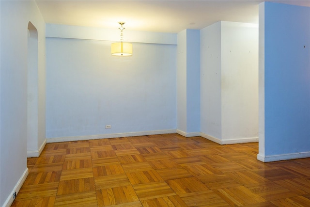 spare room with light parquet flooring