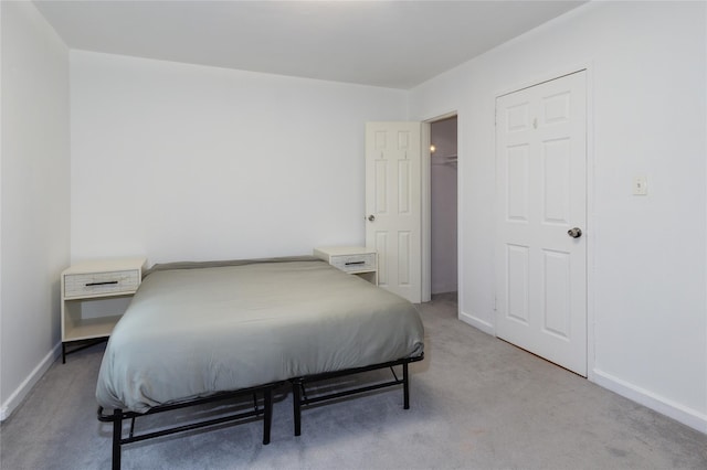 bedroom with light carpet