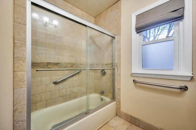 bathroom featuring enclosed tub / shower combo and tile patterned floors