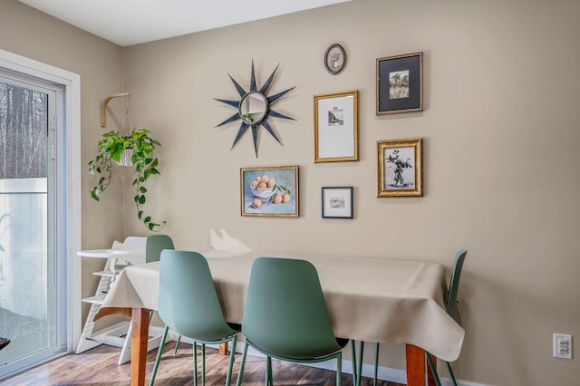 dining room featuring hardwood / wood-style floors