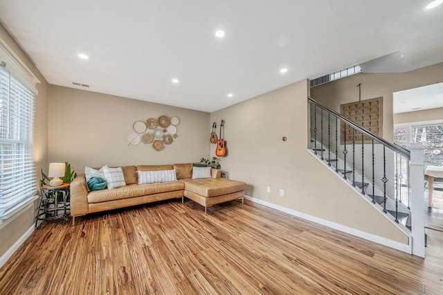 living room with light hardwood / wood-style flooring