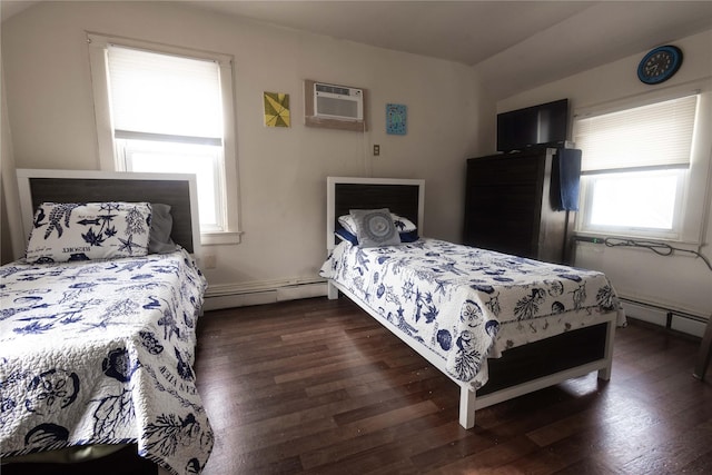 bedroom with dark hardwood / wood-style flooring, vaulted ceiling, a wall mounted AC, and baseboard heating