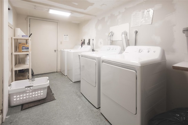 laundry area with washing machine and dryer