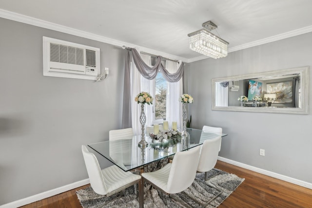 dining space featuring crown molding, a wall mounted air conditioner, dark wood-type flooring, and a notable chandelier