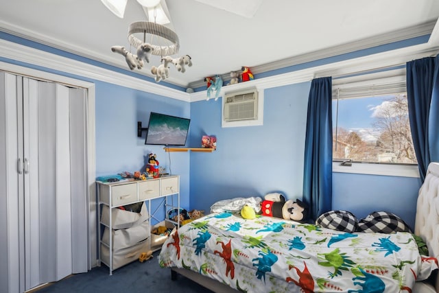 bedroom with a wall mounted air conditioner, a notable chandelier, ornamental molding, and carpet flooring