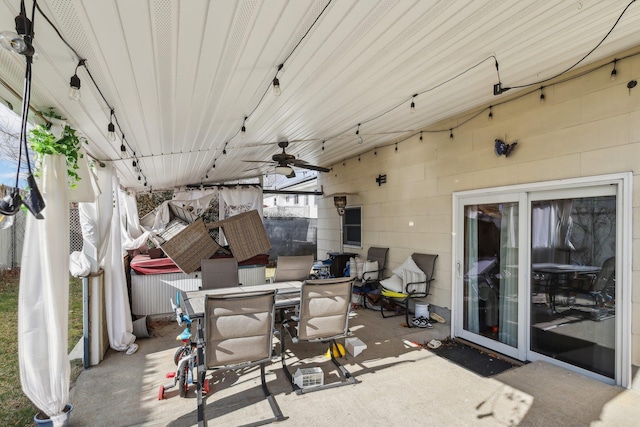 view of patio / terrace featuring ceiling fan