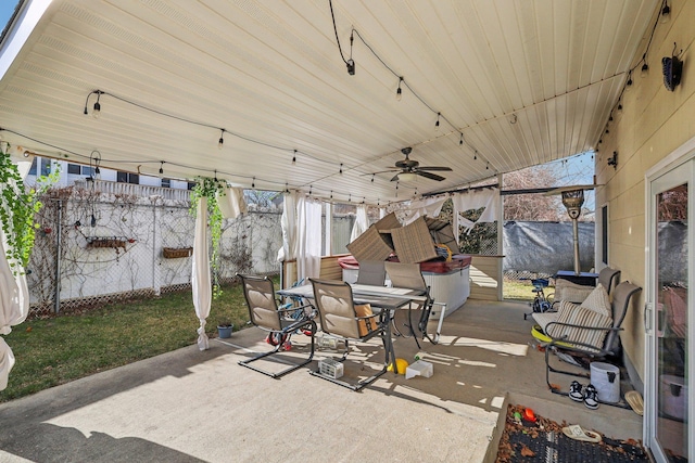 view of patio / terrace featuring ceiling fan