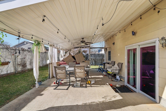 view of patio with ceiling fan