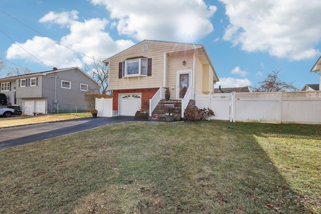 split foyer home with a garage and a front lawn