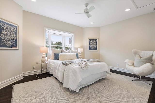 bedroom featuring ceiling fan, baseboards, wood finished floors, and recessed lighting