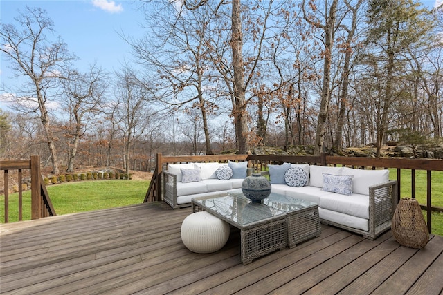 deck featuring outdoor lounge area and a yard