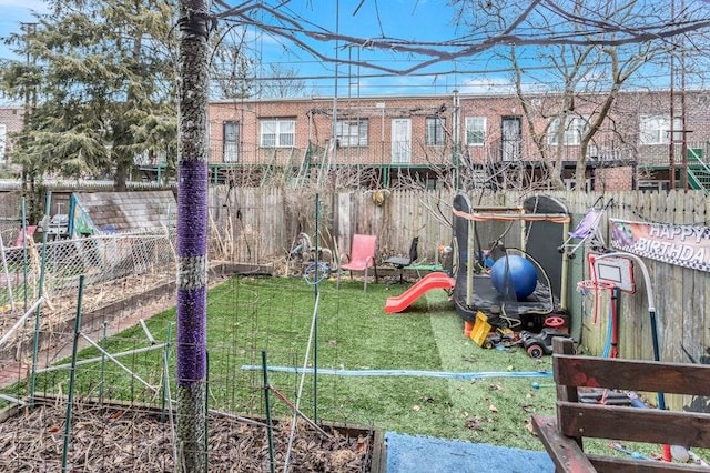 view of play area featuring a yard