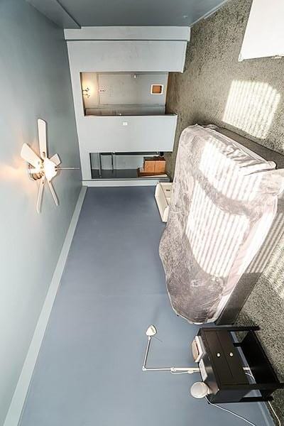 unfurnished room with concrete floors