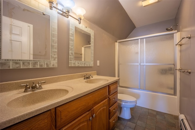 full bathroom featuring vanity, a baseboard heating unit, shower / bath combination with glass door, and toilet